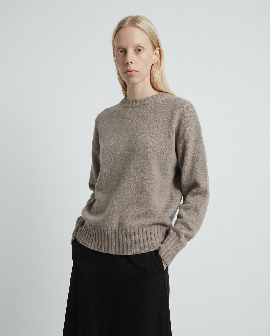 woman wearing a beige taupe crewneck sweater made in italy casa nodale merino wool and cashmere