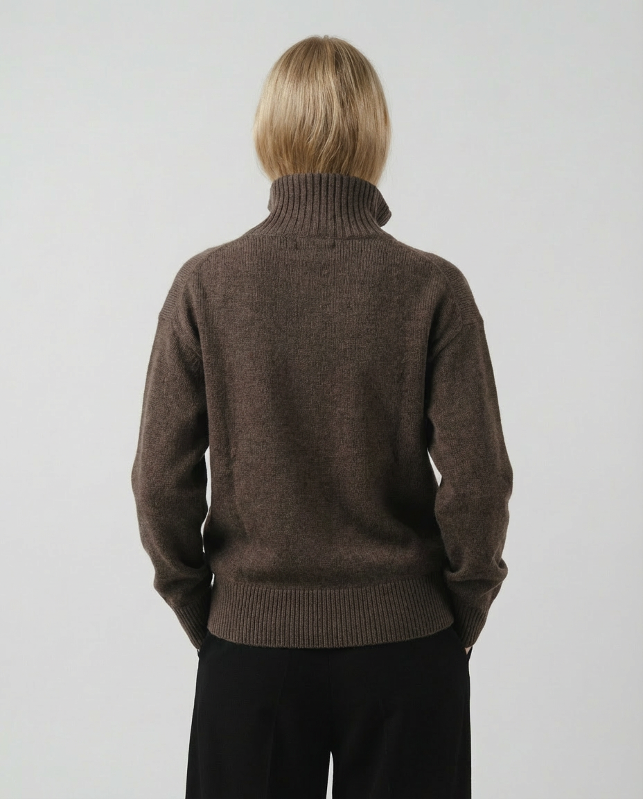woman wearing a dark brown zip-up cardigan sweater made in italy casa nodale merino wool and cashmere